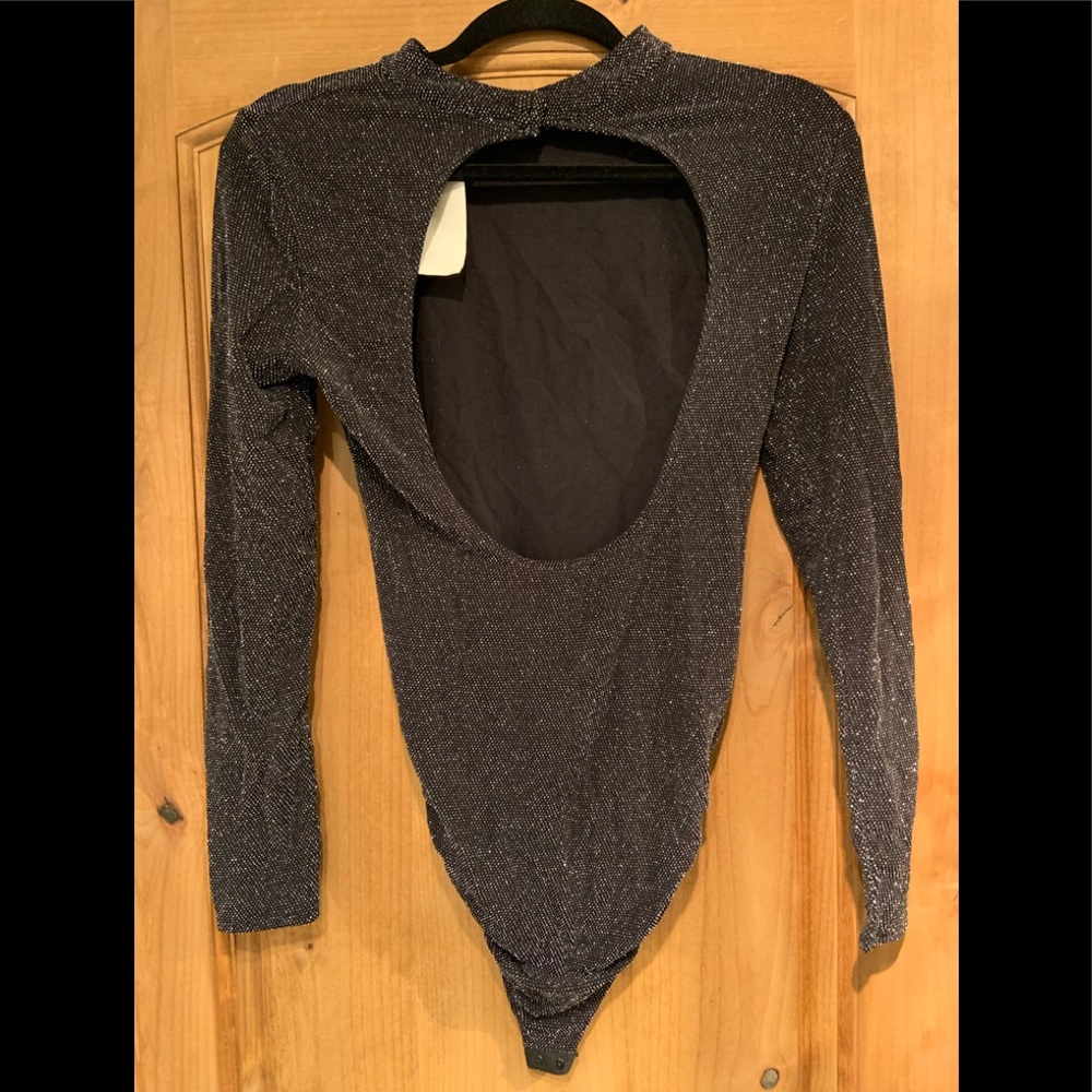 Black with sparkles! Great for evening out! Dress up or down!